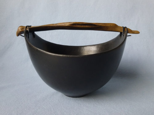 Anne Morrison. Black bowl with dark wood