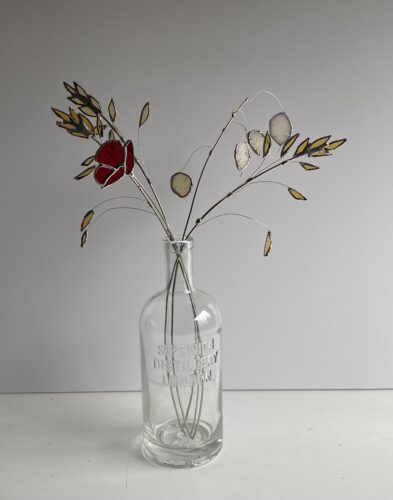 Stained glass flowers with red poppies by Samantha Yates