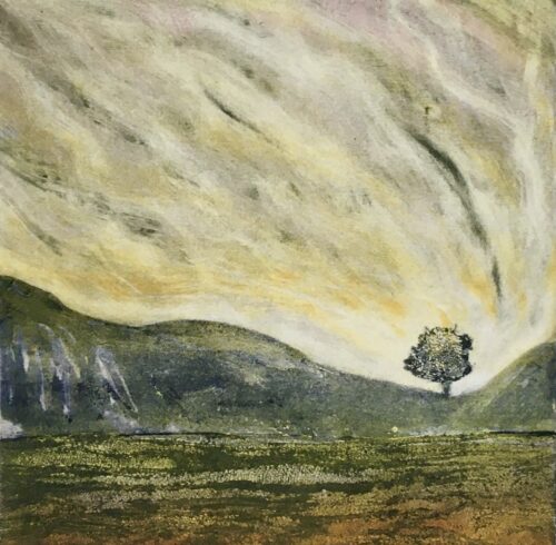 Collagraph print of Tree nestled in a hollow between two hills silhouetted against a sunset sky