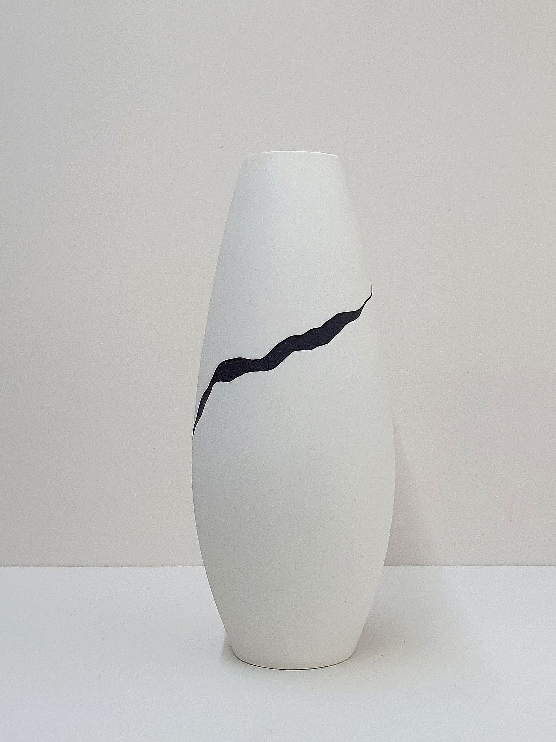 Leonie Rutter, Vessel 452 White tall wheel thrown porcelain vessel, inlaid with black ribbon £105