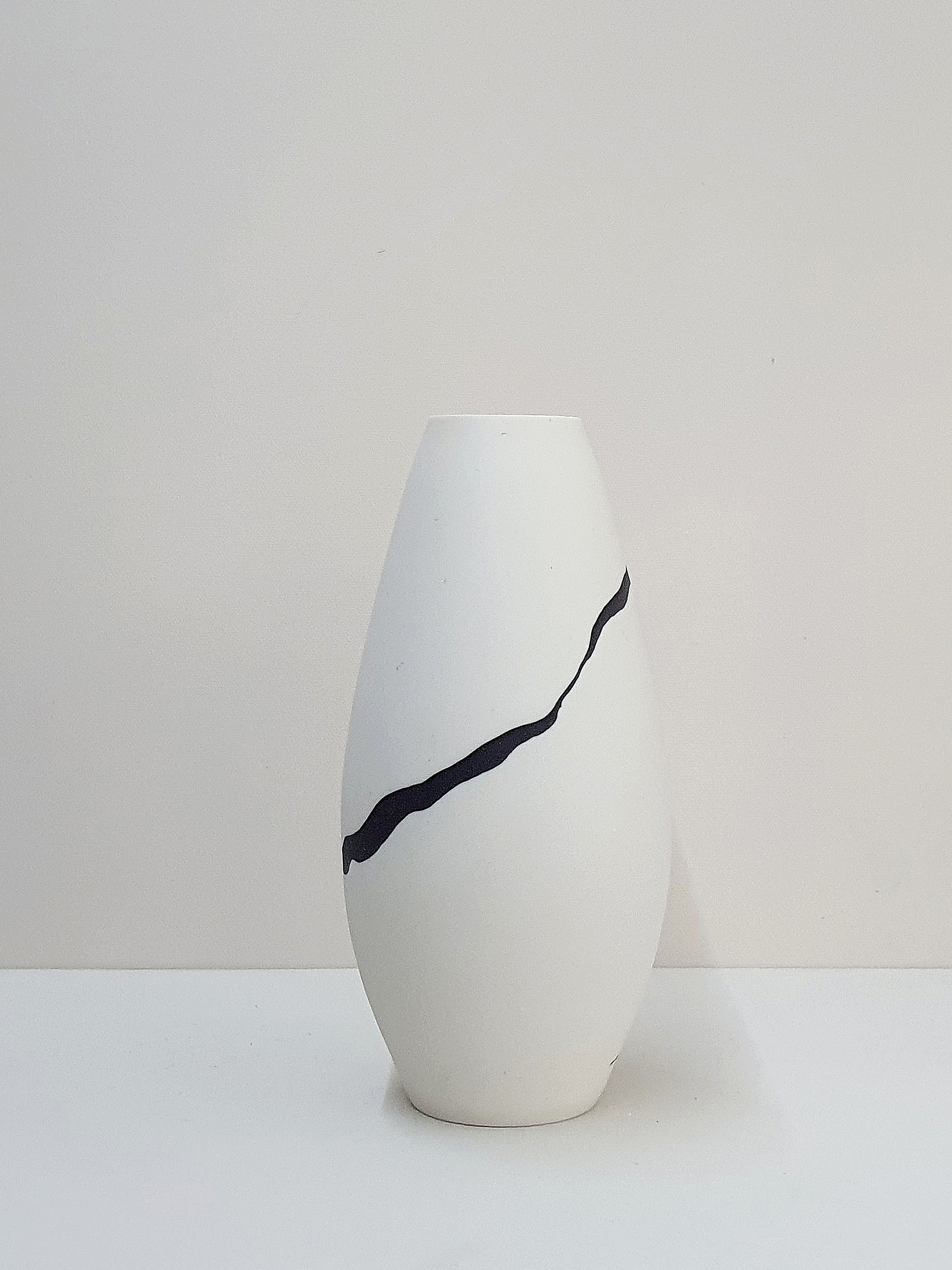 Leonie Rutter, Vessel 453 White wheel thrown porcelain vessel, inlaid with black ribbon £80