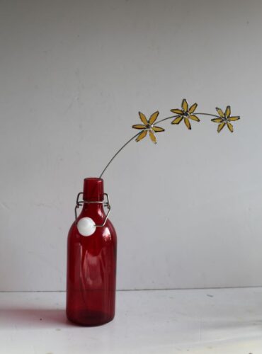 Samantha Yates. Winter Jasmine in red bottle